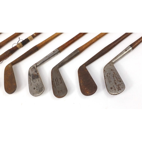 776 - Eight assorted wooden shafted golf clubs, the largest 100cm in length