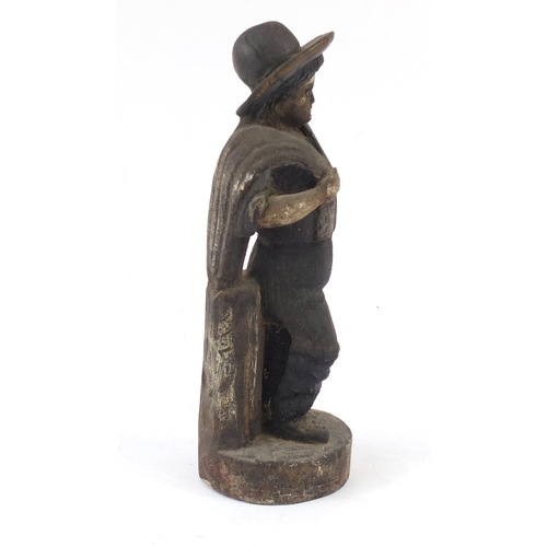 1448 - Polychrome painted wood carving of a farmer, 36cm high