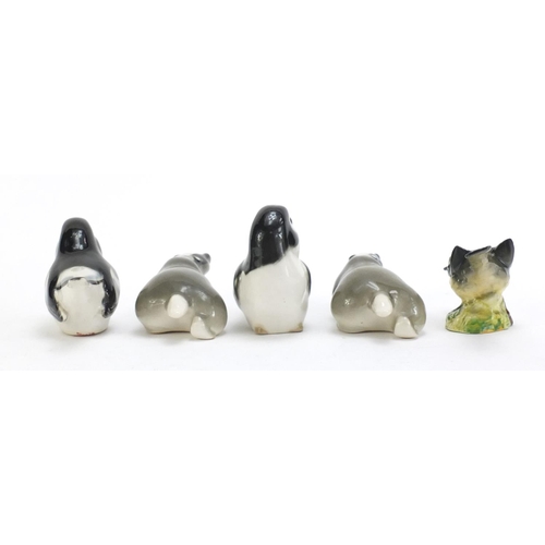 1443 - Collectable animals comprising two USSR badgers, two USSR birds and a Beswick bird, the largest 12cm... 