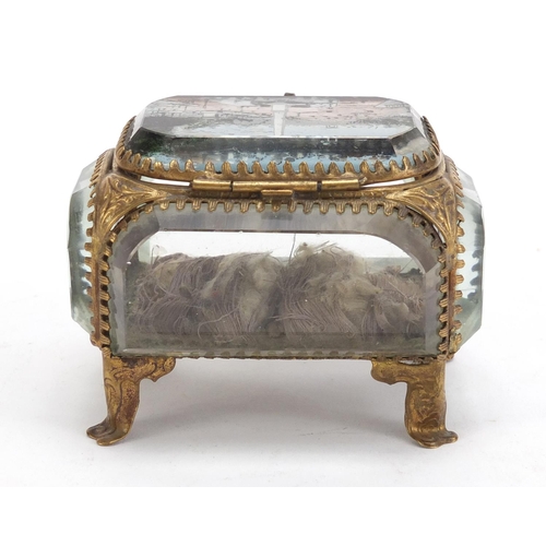 81 - French brass and bevelled glass jewel casket, having a hinged lid decorated with Les Champs Elysees,... 