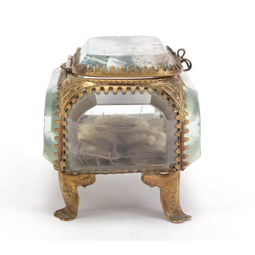 81 - French brass and bevelled glass jewel casket, having a hinged lid decorated with Les Champs Elysees,... 