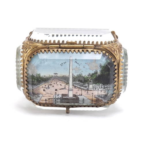 81 - French brass and bevelled glass jewel casket, having a hinged lid decorated with Les Champs Elysees,... 