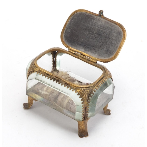 81 - French brass and bevelled glass jewel casket, having a hinged lid decorated with Les Champs Elysees,... 