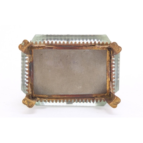 81 - French brass and bevelled glass jewel casket, having a hinged lid decorated with Les Champs Elysees,... 