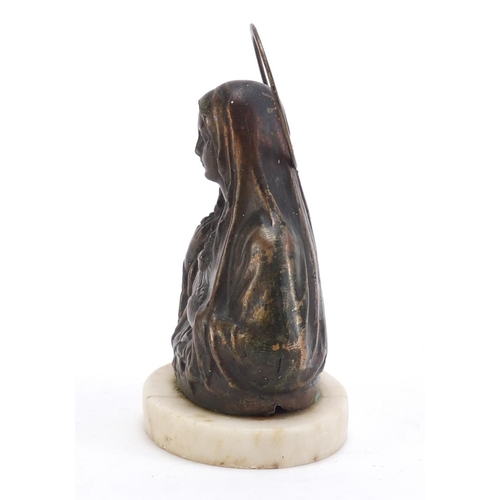 248 - Classical bronzed bust of Madonna raised on an oval marble base, 14cm high