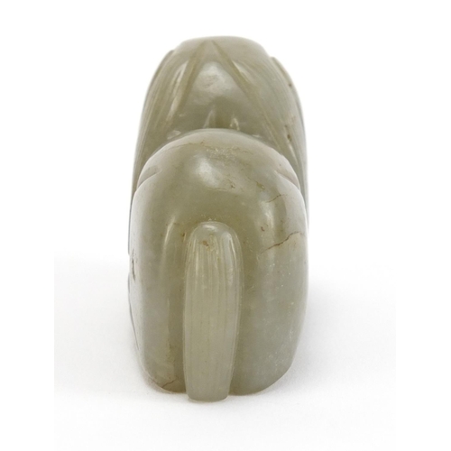 495 - Chinese green and russet jade carving of a lion, 7cm in length