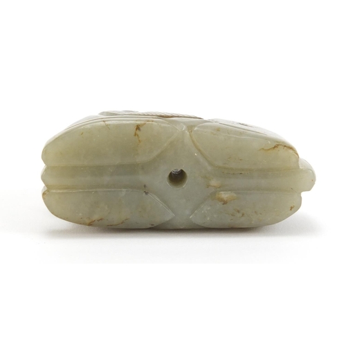 495 - Chinese green and russet jade carving of a lion, 7cm in length