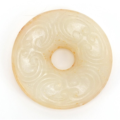 494 - Chinese carved white jade disc, 5.5cm in diameter