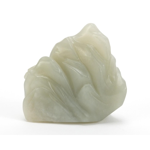 837 - Chinese pale green jade carving of a figure beside a tree before a mountain, 6cm high