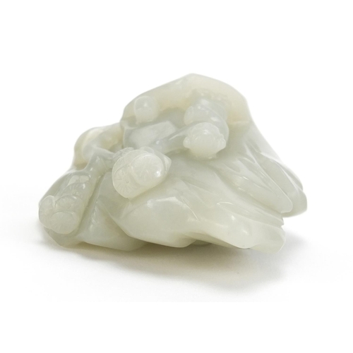 837 - Chinese pale green jade carving of a figure beside a tree before a mountain, 6cm high