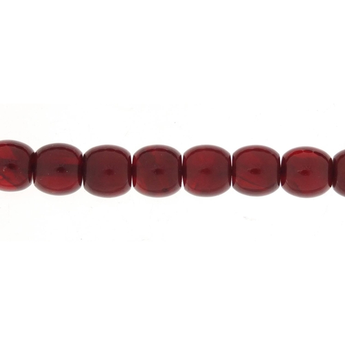 533 - Islamic cherry amber coloured prayer bead necklace, 38cm in length