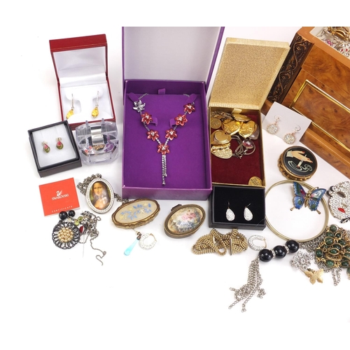 358A - Costume jewellery arranged in a box with mirrored back and base drawer, including a pair of 9ct gold... 