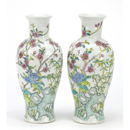 391 - Pair of Chinese porcelain vases hand painted with birds amongst trees, iron red character marks to t... 