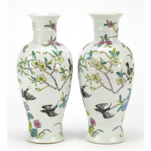 391 - Pair of Chinese porcelain vases hand painted with birds amongst trees, iron red character marks to t... 