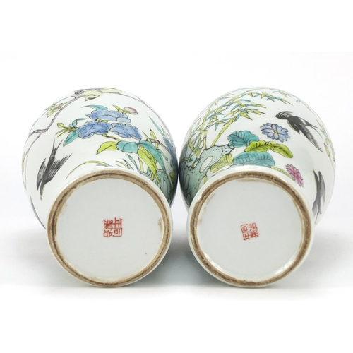 391 - Pair of Chinese porcelain vases hand painted with birds amongst trees, iron red character marks to t... 