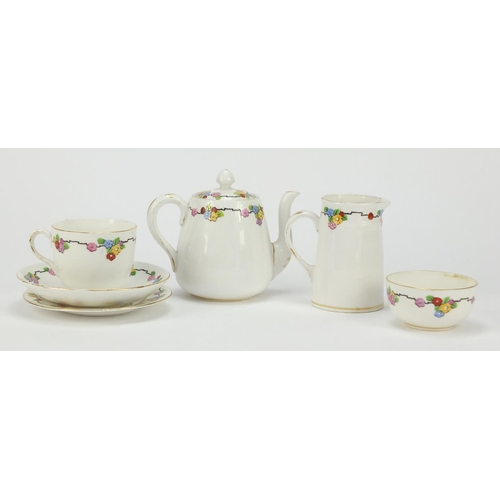 1223 - Crown Staffordshire tea for one decorated with flowers, the teapot 11.5cm high