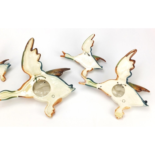 136 - Graduated set of five Beswick mallard wall plaques, the largest 30cm wide