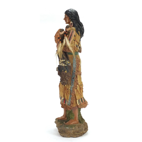 949 - Red Indian chief wall mask and a Mother with Child, the largest 60cm high