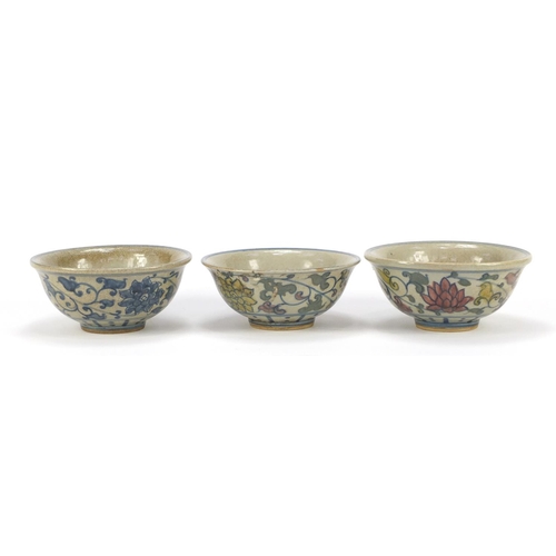 1222 - Three Chinese porcelain bowls hand painted with figures and flowers, each 14.5cm in diameter