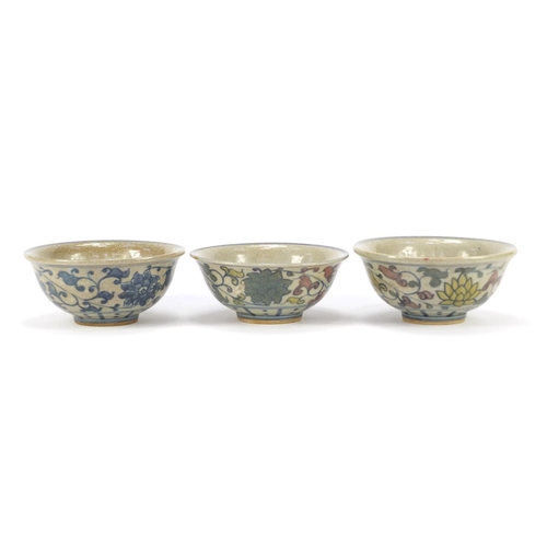 1222 - Three Chinese porcelain bowls hand painted with figures and flowers, each 14.5cm in diameter