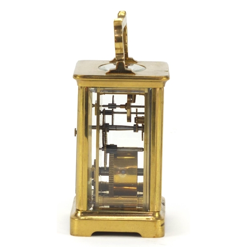 221 - Brass carriage clock with enamel dial and Roman numerals, 10.5cm high