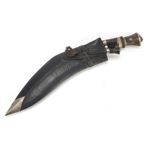 1221 - Kukri knife with leather sheath, 43cm in length