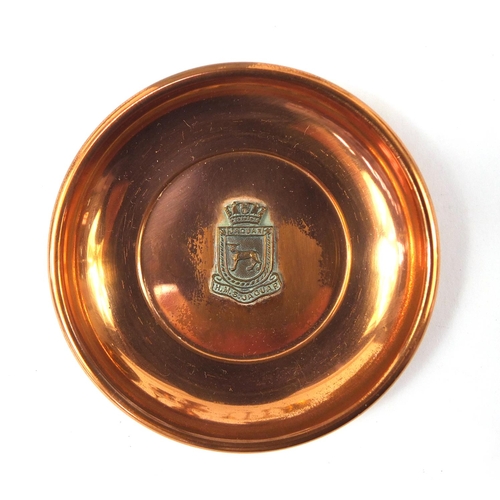 1413 - Copper and brassware including jugs and pair of candlesticks, the largest 25.5cm in diameter