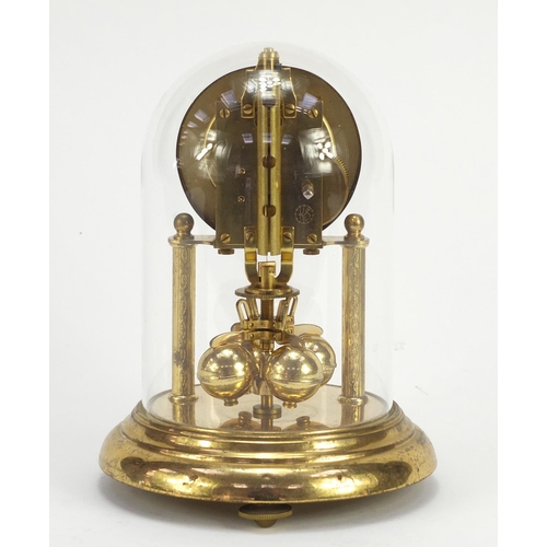 1174 - Kein anniversary clock with glass dome, 19cm high