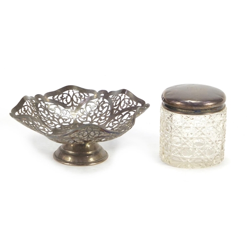 464 - Pierced silver bon bon dish and a cut glass jar with silver lid, the largest 14.5cm in diameter