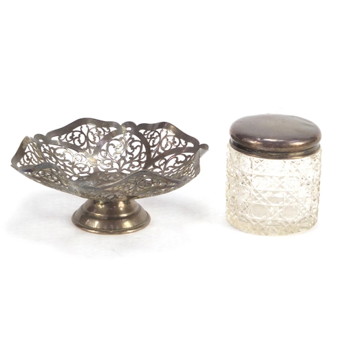 464 - Pierced silver bon bon dish and a cut glass jar with silver lid, the largest 14.5cm in diameter