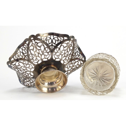 464 - Pierced silver bon bon dish and a cut glass jar with silver lid, the largest 14.5cm in diameter