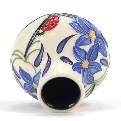 421 - Moorcroft pottery vase hand painted with a ladybird and flowers, dated 2005, 6cm high