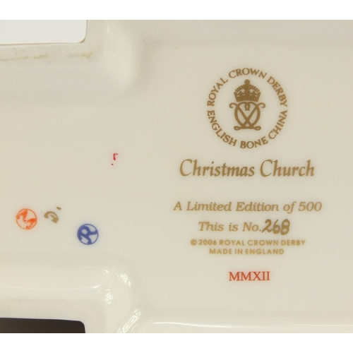 934 - Two Royal Crown Derby paperweights comprising Christmas Church limited edition 268/500 and Rocking H... 