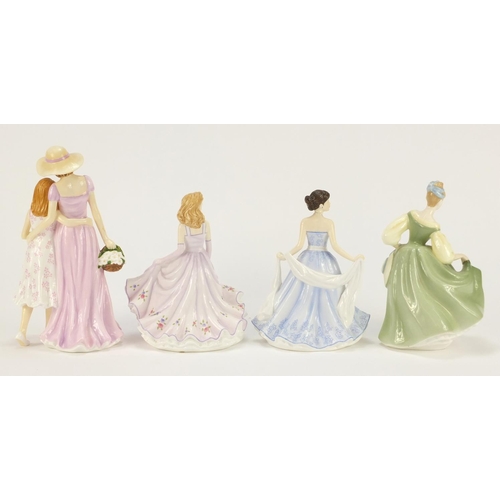 917 - Four Royal Doulton figurines including Togetherness HN5589 and Danielle HN5529, the largest 22.5cm h... 