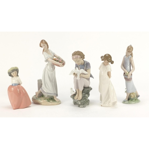 916 - Five Lladro and Nao figurines including a girl holding a basket of flowers, the largest 25.5cm high