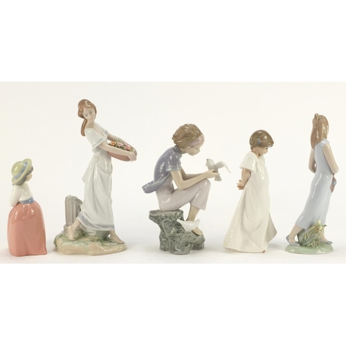 916 - Five Lladro and Nao figurines including a girl holding a basket of flowers, the largest 25.5cm high