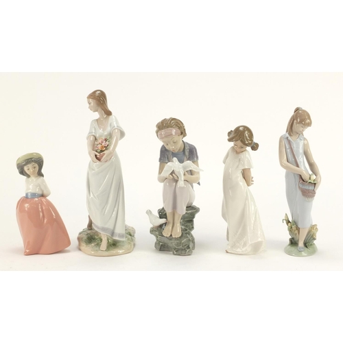 916 - Five Lladro and Nao figurines including a girl holding a basket of flowers, the largest 25.5cm high