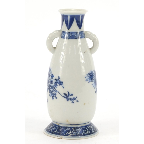 1177 - Japanese blue and white porcelain vase with twin handles, hand painted with a butterfly amongst flow... 