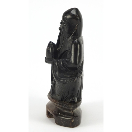 229 - Chinese soapstone carving of an Elder holding a peach and staff, 14cm high