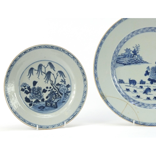 226 - Pair Chinese blue and white porcelain plates and a charger, each hand painted with landscapes, the l... 