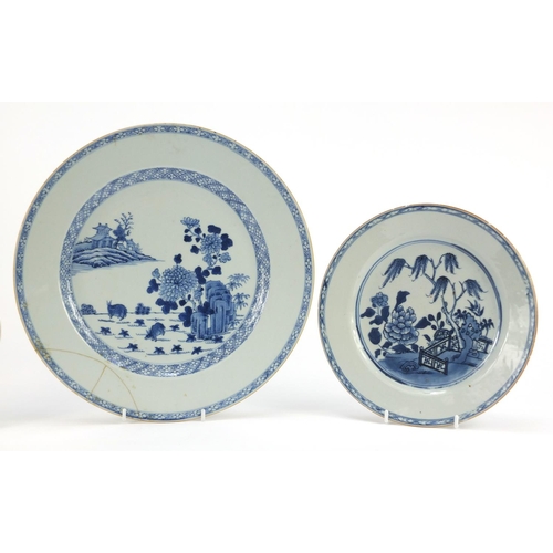 226 - Pair Chinese blue and white porcelain plates and a charger, each hand painted with landscapes, the l... 