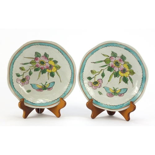 308 - Pair of Chinese porcelain footed plates, hand painted with flowers and butterflies, each 20cm in dia... 