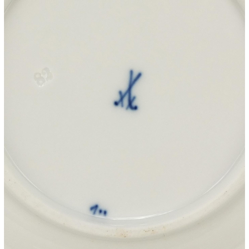 856 - Eleven Meissen tea plates, each hand painted in the Blue Onion pattern, crossed sword marks to the b... 