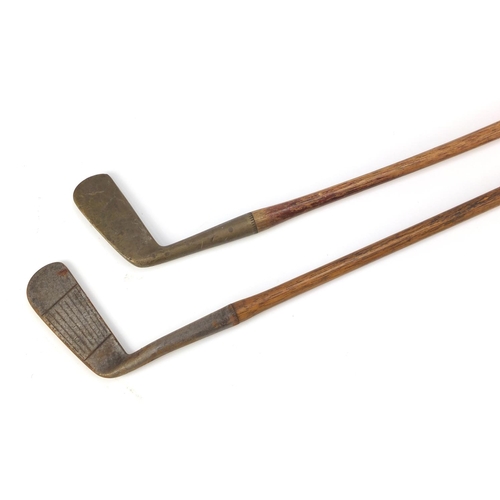 770 - Brass headed FH Ayres Ltd wooden shafted golf putter together with an M Daragon Tooting Bec accurate... 