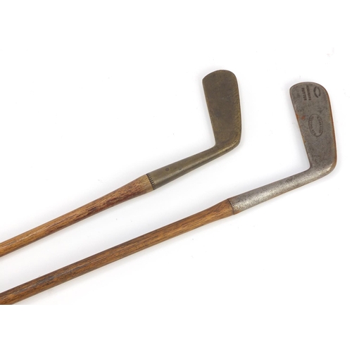 770 - Brass headed FH Ayres Ltd wooden shafted golf putter together with an M Daragon Tooting Bec accurate... 