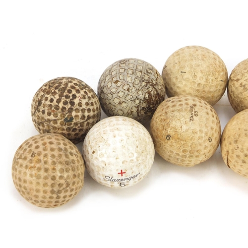 607 - Twelve golf vintage balls including Dunlop 65, Slazenger 6 and Penfold