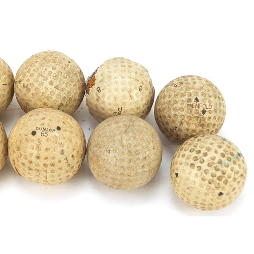 607 - Twelve golf vintage balls including Dunlop 65, Slazenger 6 and Penfold