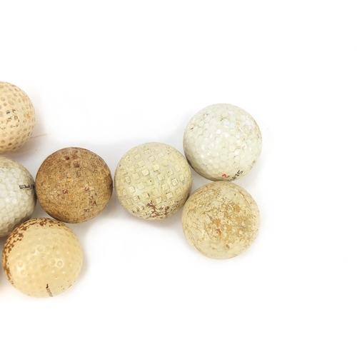 778 - Twelve vintage golf balls including Warwick, Dunlop 65, Ultra TC, Staff 2 and Tour 432