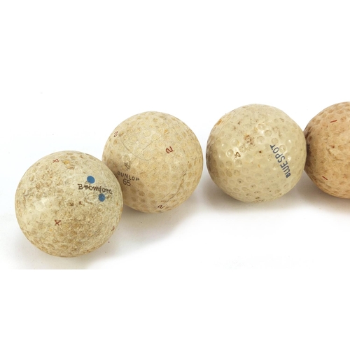 779 - Six Vintage golf balls including Par Player, Blue Spot, Bromford, Dunlop 65 and Slazenger