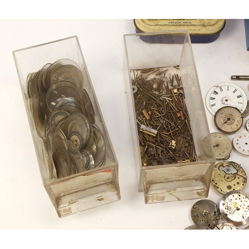 483A - Collecton of Antique and later watch parts including crystals, movements and straps